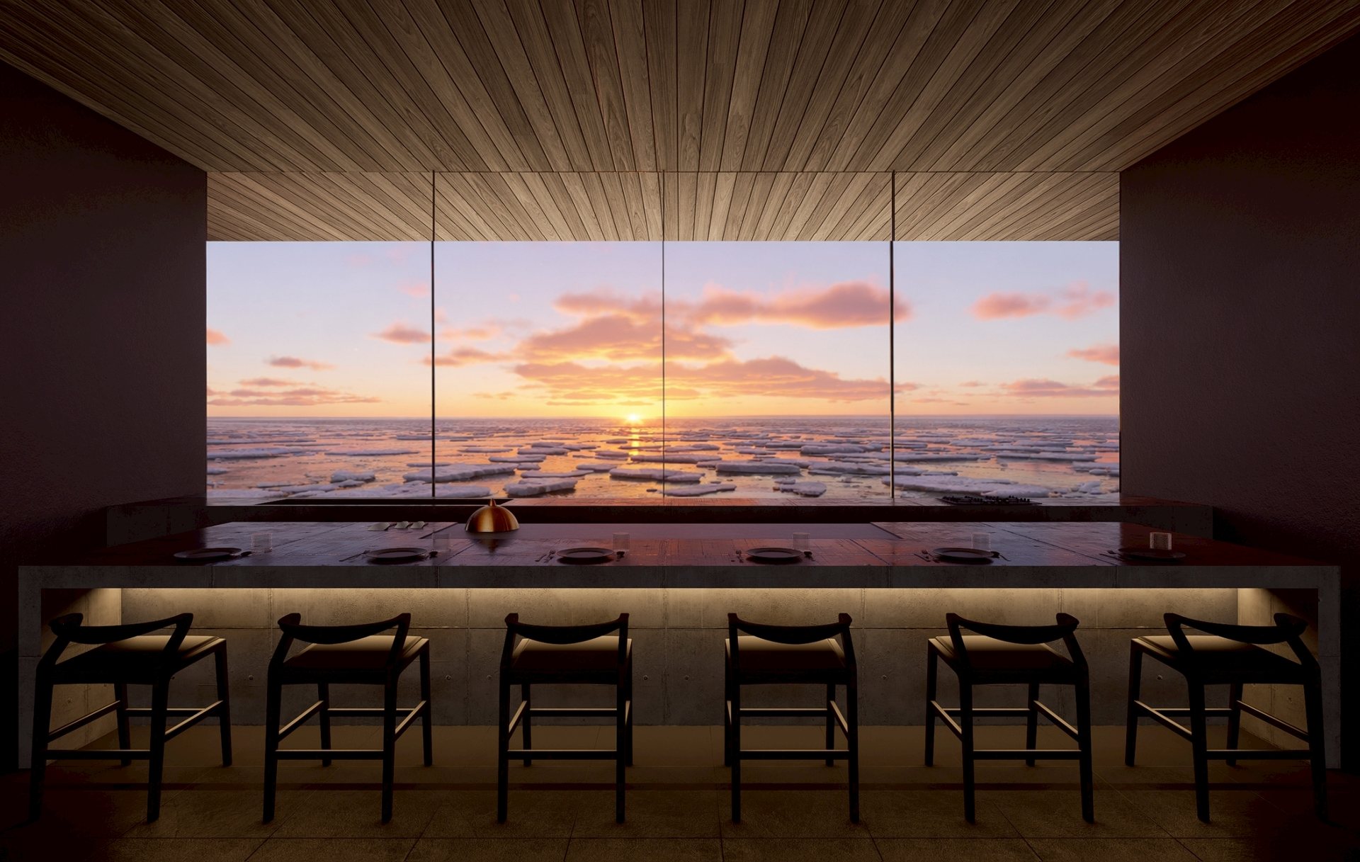 A counter facing the sunset over drift ice